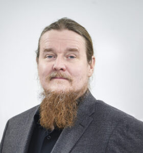 Portettikuva AKT:n puheenjohtaja Ismo Kokosta.